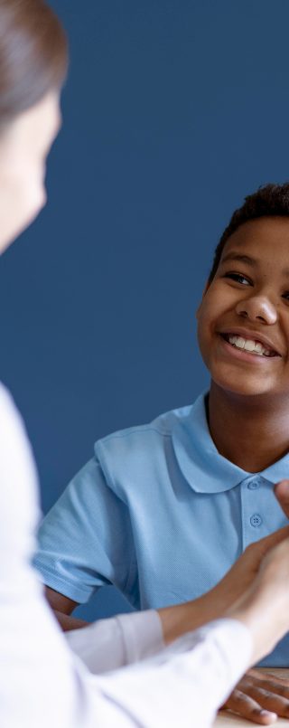 boy-doing-occupational-therapy-session-with-psychologist
